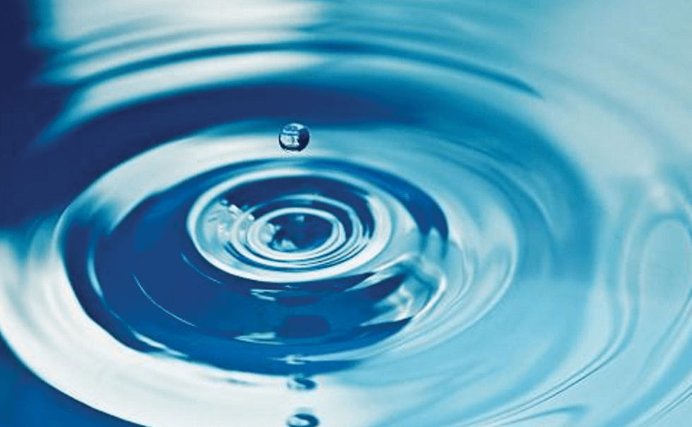 Picture of water droplet creating ripples